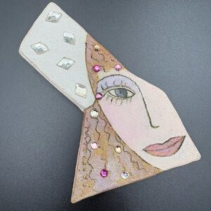 Artistic Face Brooch with Gem Accents